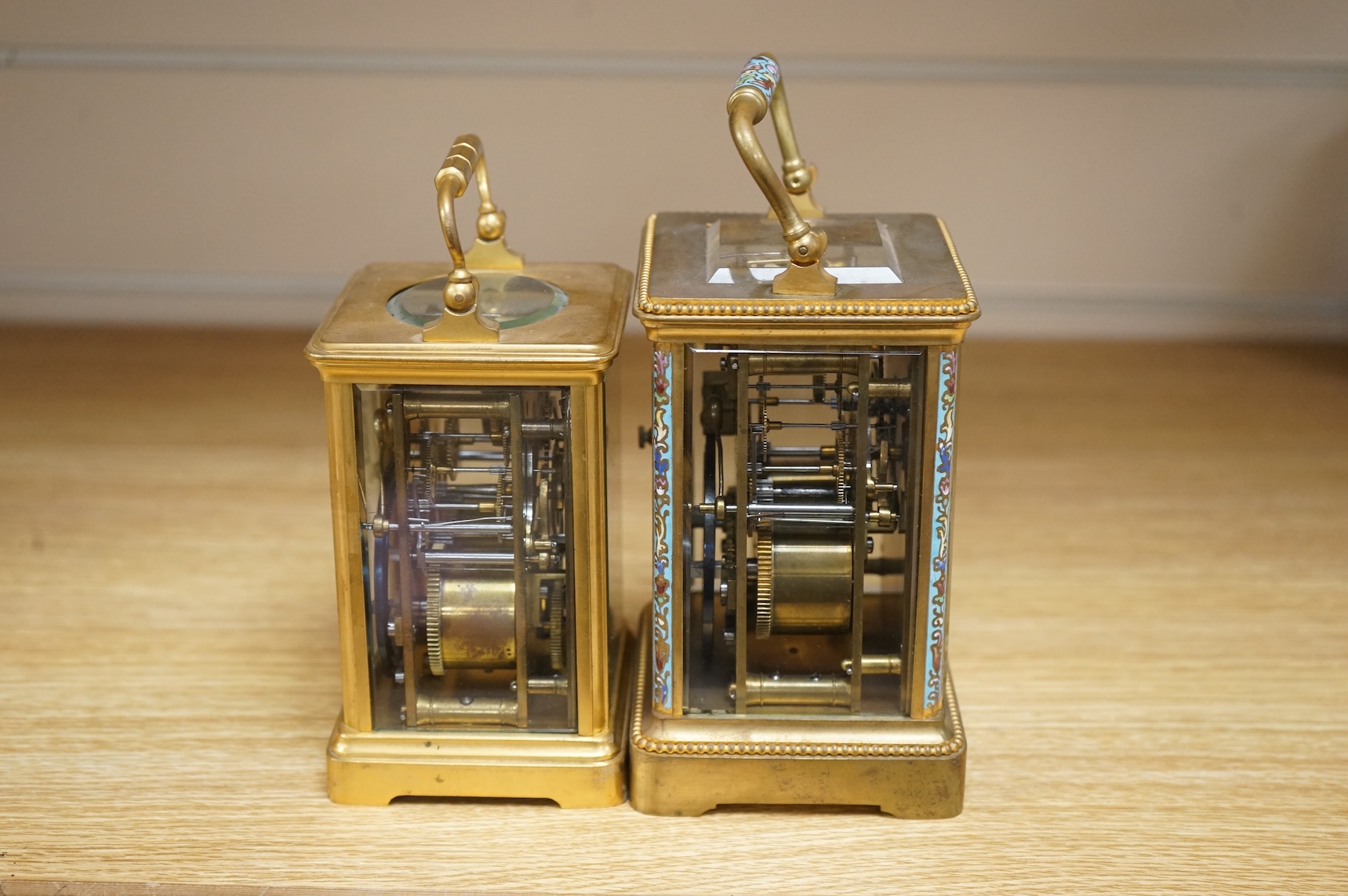 Two French carriage clocks, one champlevé enamelled, tallest 15cm
